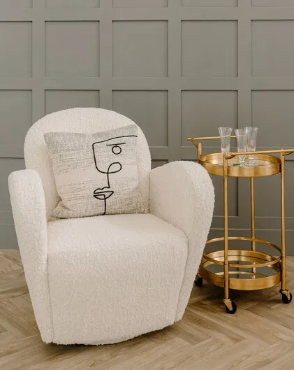 Nautilus Swivel Chair in Faux Sheepskin